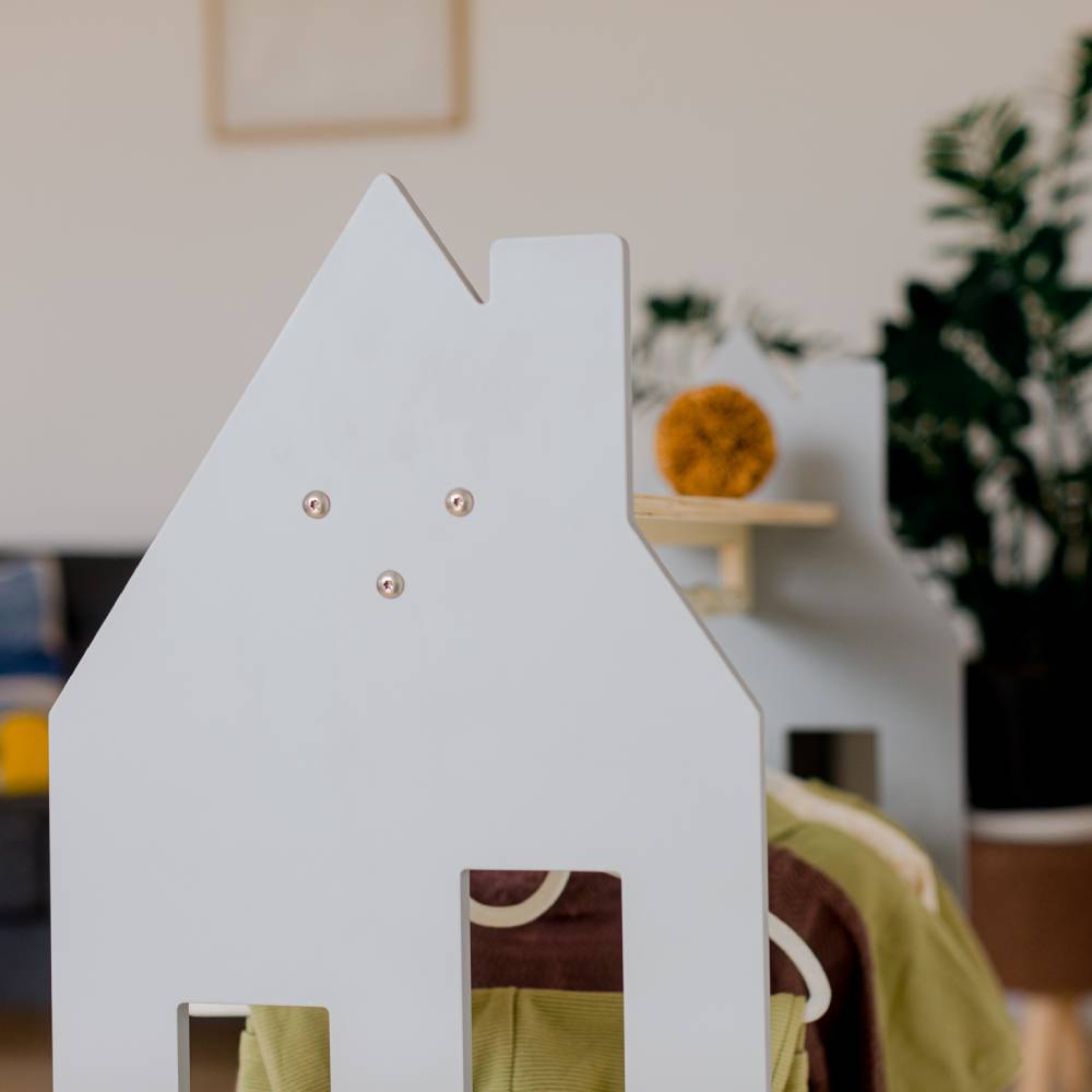 House shaped clothing rack